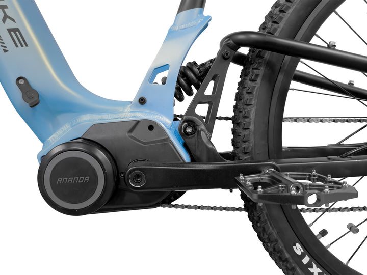 Close-up of the rear view of the mid-drive motor on the Cyberbike Fusion electric mountain bike, highlighting its robust and efficient power delivery system.